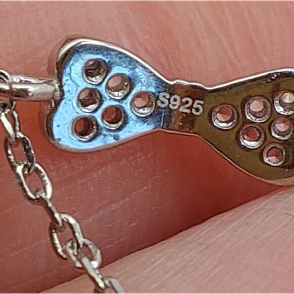 925 Sterling Silver Platinum Plated CZ Pink Bow Chain Ring - Picture 4 of 4